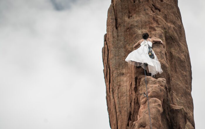 Bride claiming up rock